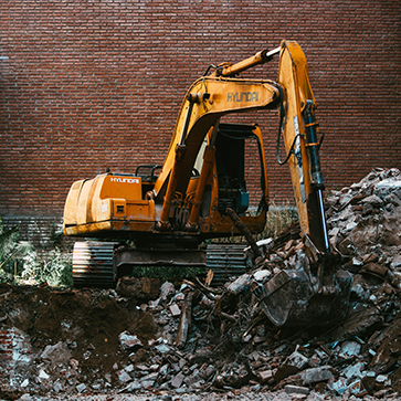 https://unsplash.com/photos/yellow-excavator-beside-brown-brick-wall-BOxZrWD2-w0?utm_content=creditShareLink&utm_medium=referral&utm_source=unsplash